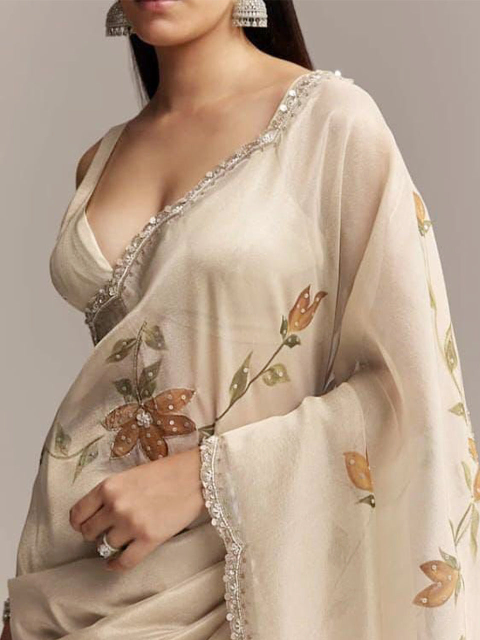 Ethereal Elegance: Ivory Organza Saree with Hand Embroidered Floral Motifs